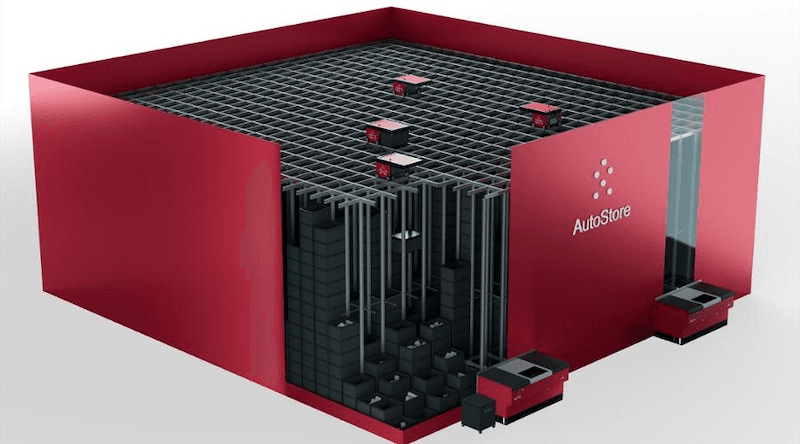 AutoStore 큐브형 자동 보관·회수(ASRS) 시스템 렌더링 — 붉은 그리드 상단을 로봇이 주행하고 하단에 빈이 적재된 구조